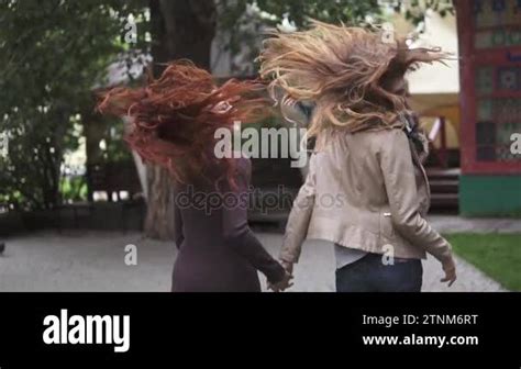 Two Crazy Redheads Girlfriends Having Fun Frolic And Jump The View