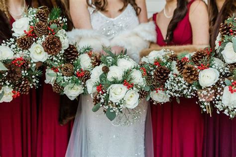 The Bridesmaids Are Holding Their Bouquets With Pine Cones