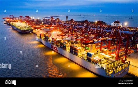 Aerial View Of Container Vessels Working At The Yangshan Port In