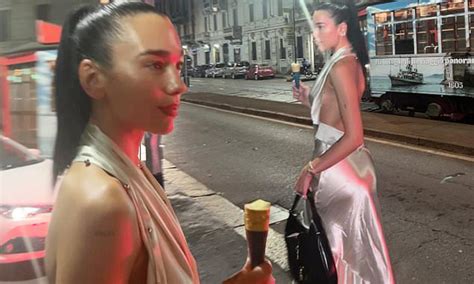 Dua Lipa Teases A Hint Of Sideboob In A Plunging Silver Satin Dress As