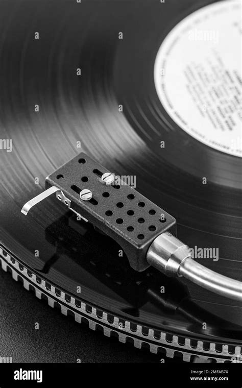 Black Vinyl Record Spinning On A Vintage Stereo Turntable Stock Photo