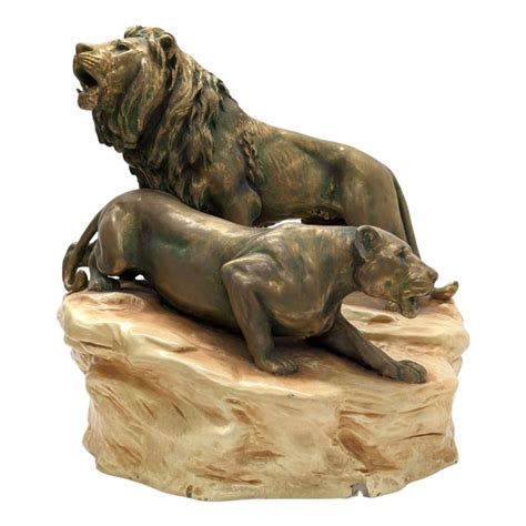 MARSEILLEANTIQUITES Couple de lions en faïence irisée de Bohème 1950