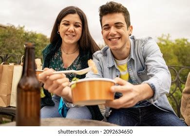 Couple Young People Eating Outdoors On Stock Photo 2092634650 ...