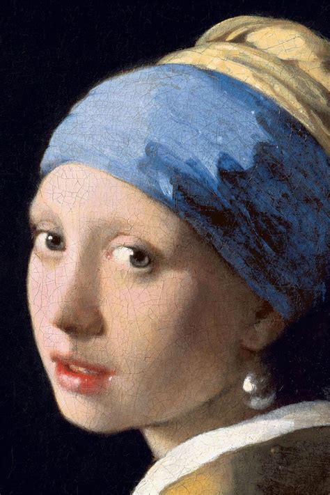 A Painting Of A Girl With A Pearl Ear Wearing A Blue And Gold Turban