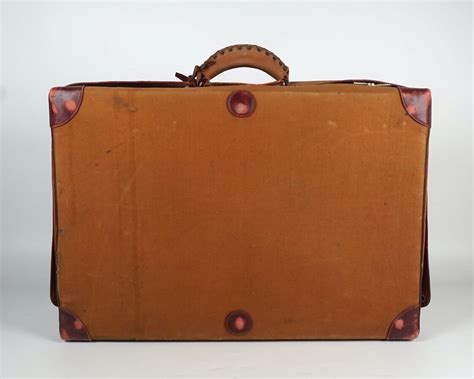 hermes valise cuir bordeaux fermeture en metal argente marque