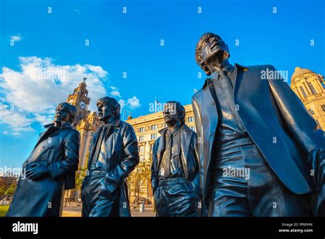 Liverpool UK May 17 2018 Bronze Statue Of The Beatles Stands At The