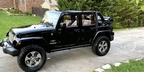 2017 Jeep JK Sahara Unlimited 52k miles. 3.6 with auto trans. Black with ten leather interior ...