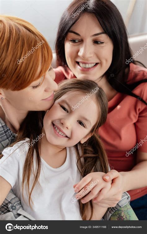 Cheerful Kid Smiling Camera Same Sex Parents Couch Stock Photo Haydmitriy