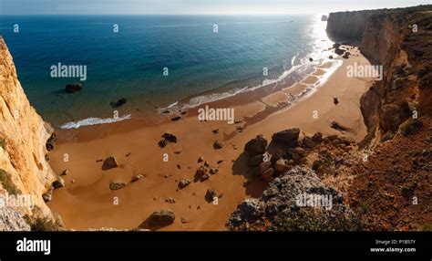 Summer Evening Atlantic Rocky Coast View With Sandy Beach Praia Da