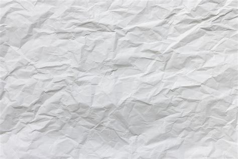 Premium Photo Crumpled Used White Wrapping Paper Texture Background