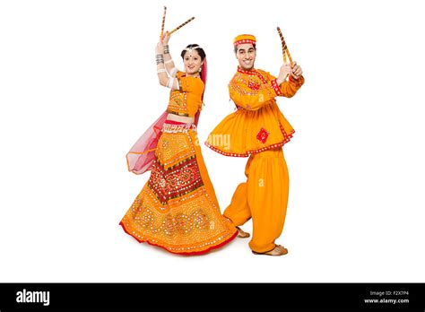 2 Indian Gujrati Married Couples Navaratri Dandiya Dance Stock Photo