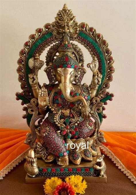 Buy Iyi Merchant Brass Ganesh Murti Ganpati Sitting On Lotus With His