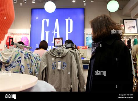 --FILE--Customers shop at a store of GAP in Shanghai, China, 2 March ...