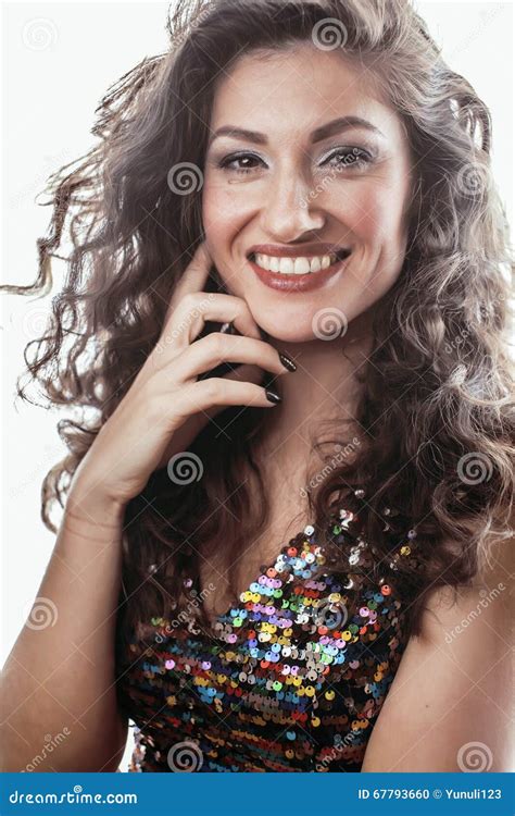 Young Brunette Woman With Curly Hairstyle In Fancy Glamur Dress