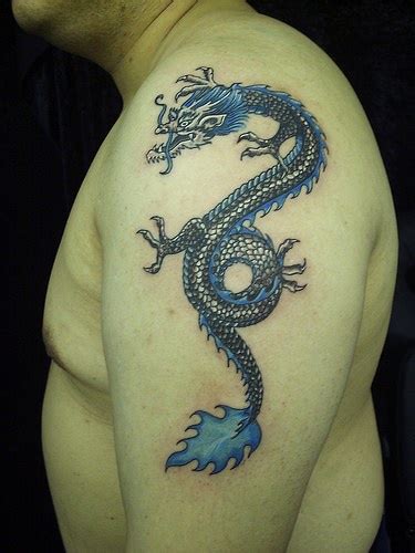 Chinese blue fire dragon tattoo on arm - Tattooimages.biz