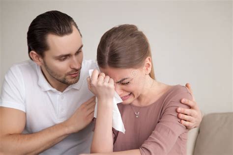 Loving Husband Man Comforting Consoling Upset Crying Wife Woman Stock