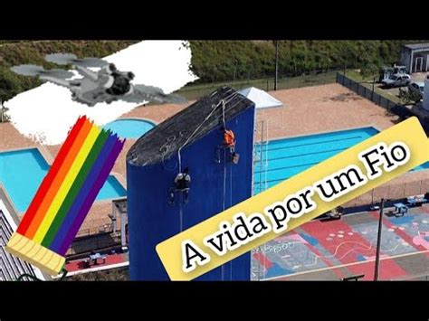 pintura nas alturas trabalhadores pintura na caixa d água dji