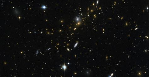 Galaxy Cluster Is A Cosmic Magnifying Glass For Hubble Telescope