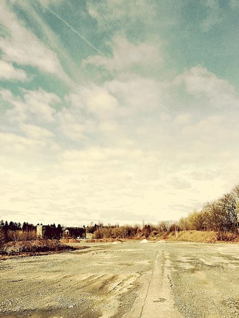 Premium Photo Surface Level Of Road Against The Sky