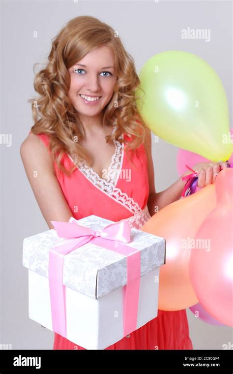 Happy Birthday Girl With Balloons Showing Her T Stock Photo Alamy