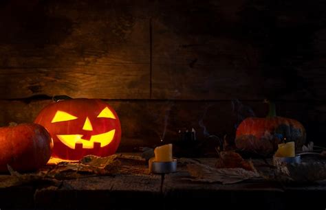 Premium Photo Halloween Pumpkins Head Jack O Lantern On Wooden Table