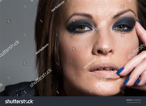 Heavy Eye Makeup Woman Wearing Heavy Eye Makeup Stock Photo Edit Now 135600689 - makeuptu.com