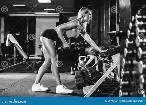 Fitness Blonde Girl Posing And Exercising With Dumbbell Stock Image Image Of Bikini