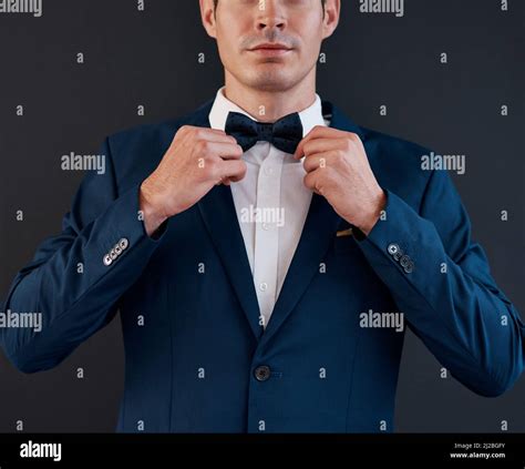 Man Bowtie Adjusting Hi Res Stock Photography And Images Alamy