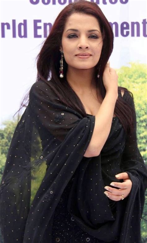 Umaaair Cute Hot Actress Celina Jaitley In Hot Black Dress