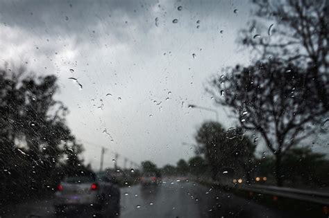 Premium Photo Raindrops On The Car Glass While Driving Through Heavy