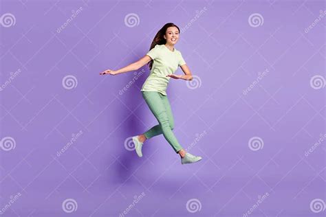 Full Length Portrait Of Attractive Lady Jump Have Fun Toothy Smile Wear