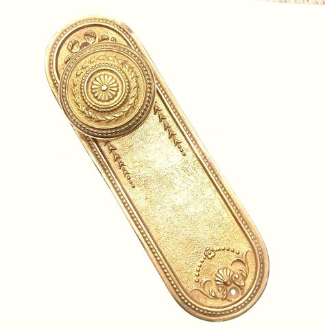 Solid Brass Ossa Plates and Knobs Set | Architectural Sales