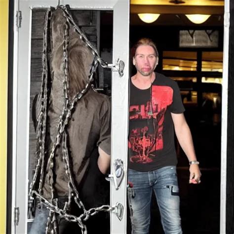 Chad Robert Kroeger Of Nickelback Tied Up With Chains Stable