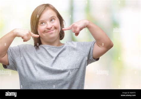 Young Adult Woman With Down Syndrome Over Isolated Background Smiling