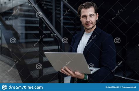 Business Man With A Laptop In His Hands Outside Stock Photo Image Of