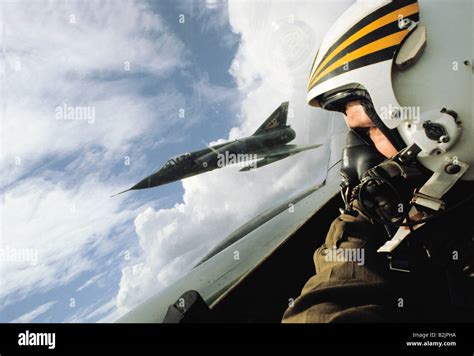 Close up cockpit view of military jet plane pilot in flight with Mirage ...