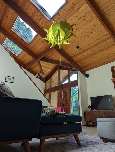 Gable entryway and cedar decking in our post and beam MCM house (bonus