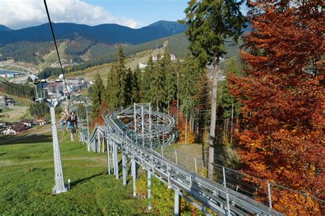 People On Ski Lift In Bukovel Village Largest Ski Resort In