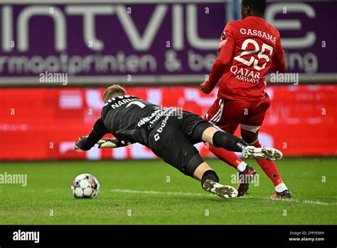 Gent S Goalkeeper Paul Nardi And Eupen S Djeidi Gassama Pictured In