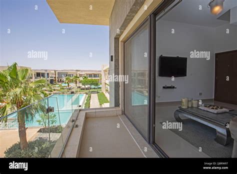 Terrace Balcony Of A Luxury Apartment In Tropical Resort With Swimming