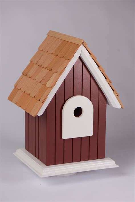 Hand craftedsolid wood birdhouse with cedar roof shingles