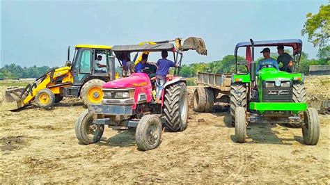 Jcb Dx Eco Excellence Backhoe Loader Machine Loading Mud In Mahindra