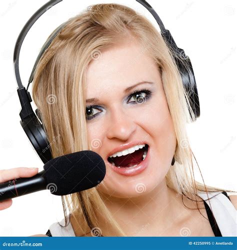 Girl Singer Musician With Headphones Singing To Mi Stock Photo - Image ...