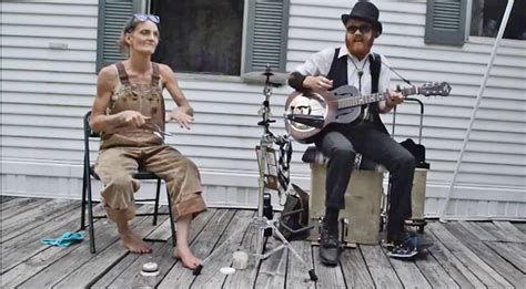 Barefoot, Overall-Wearing 'Spoon Lady' Sits Down, Greases Her Spoons ...