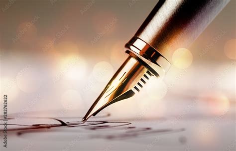 Signing a signature with a fountain pen Stock Photo | Adobe Stock