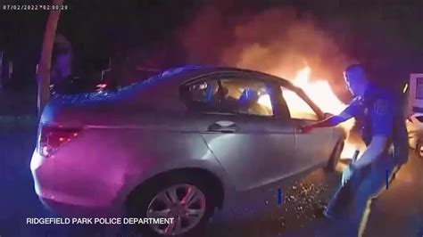 Hero Cops Save Man From Burning Car Youtube