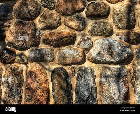 Old cobblestone wall Stock Photo - Alamy