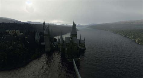 Download The Majestic Hogwarts Lake At Sunset Wallpaper