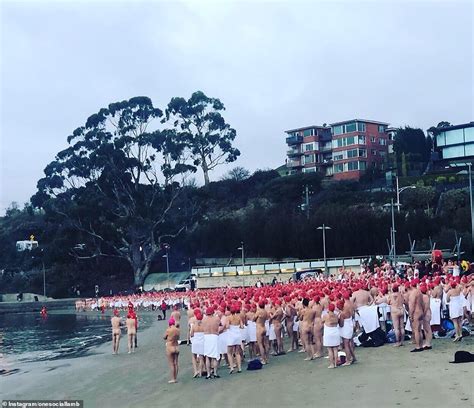 Thousands Of Naked Swimmers Brave Near Freezing Waters At The Crack Of Dawn Daily Mail Online