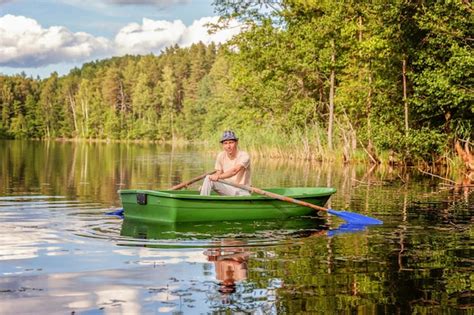 Premium Photo | Fisherman in a boat